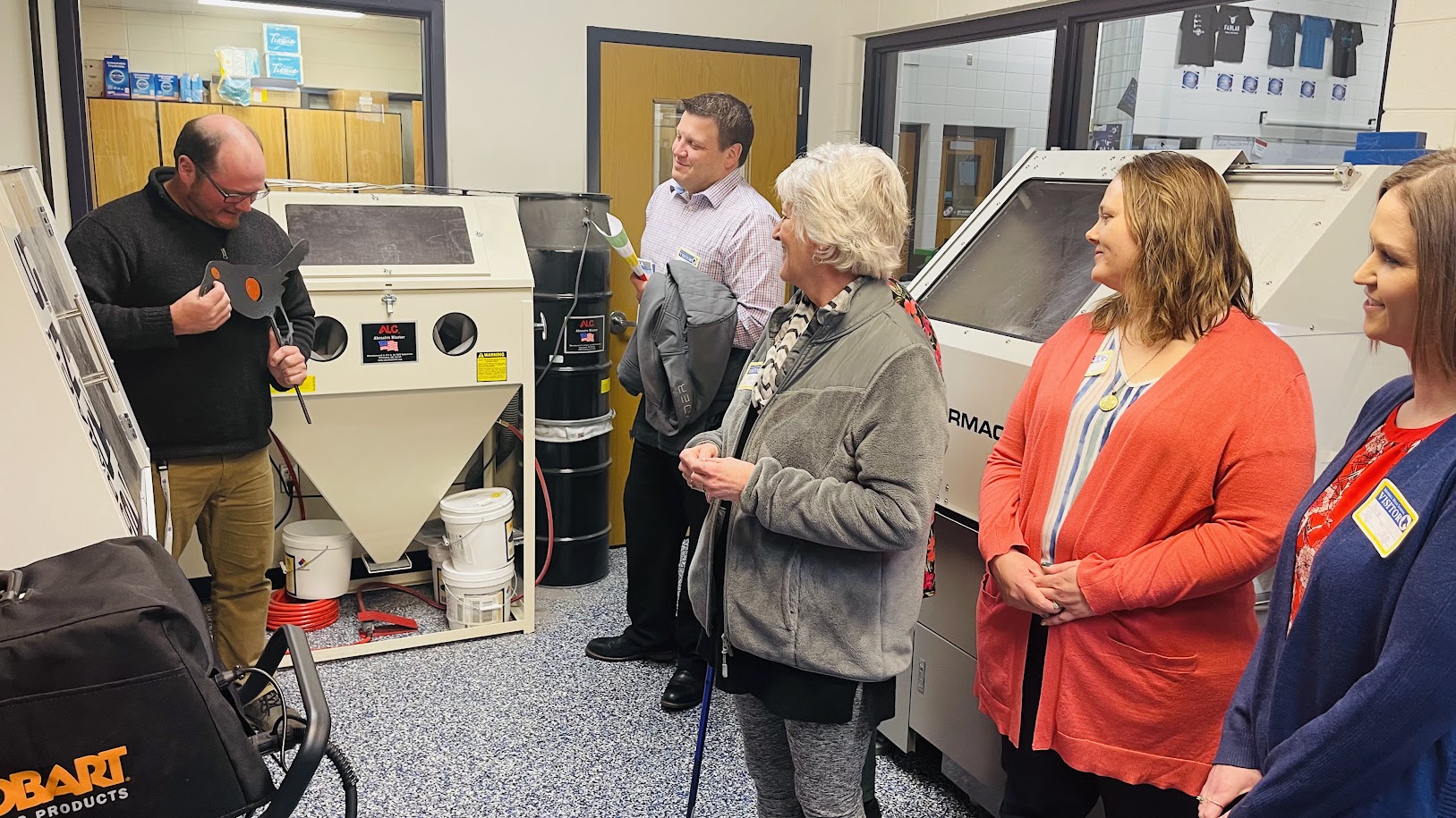 Merrill Rotarians tour the Merrill High School Fabrication Lab